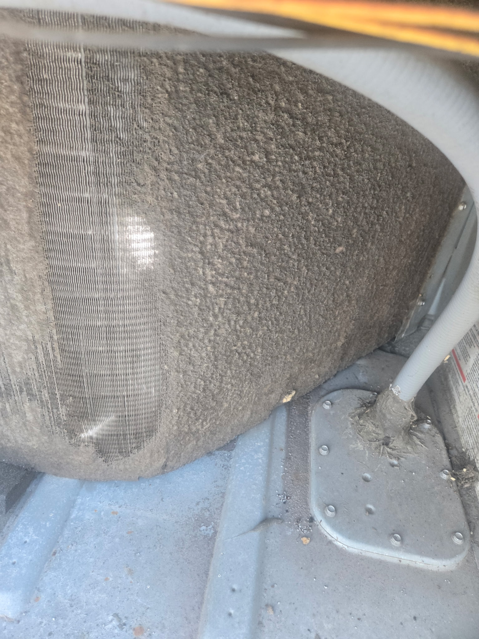 Dirty HVAC evaporator coil before ComfortMax cleaning